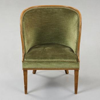Axel Einar Hjorth, A 'Bellman' elm armchair, attributed to Axel Einar Hjorth, Nordiska Kompaniet, Sweden ca 1929.
