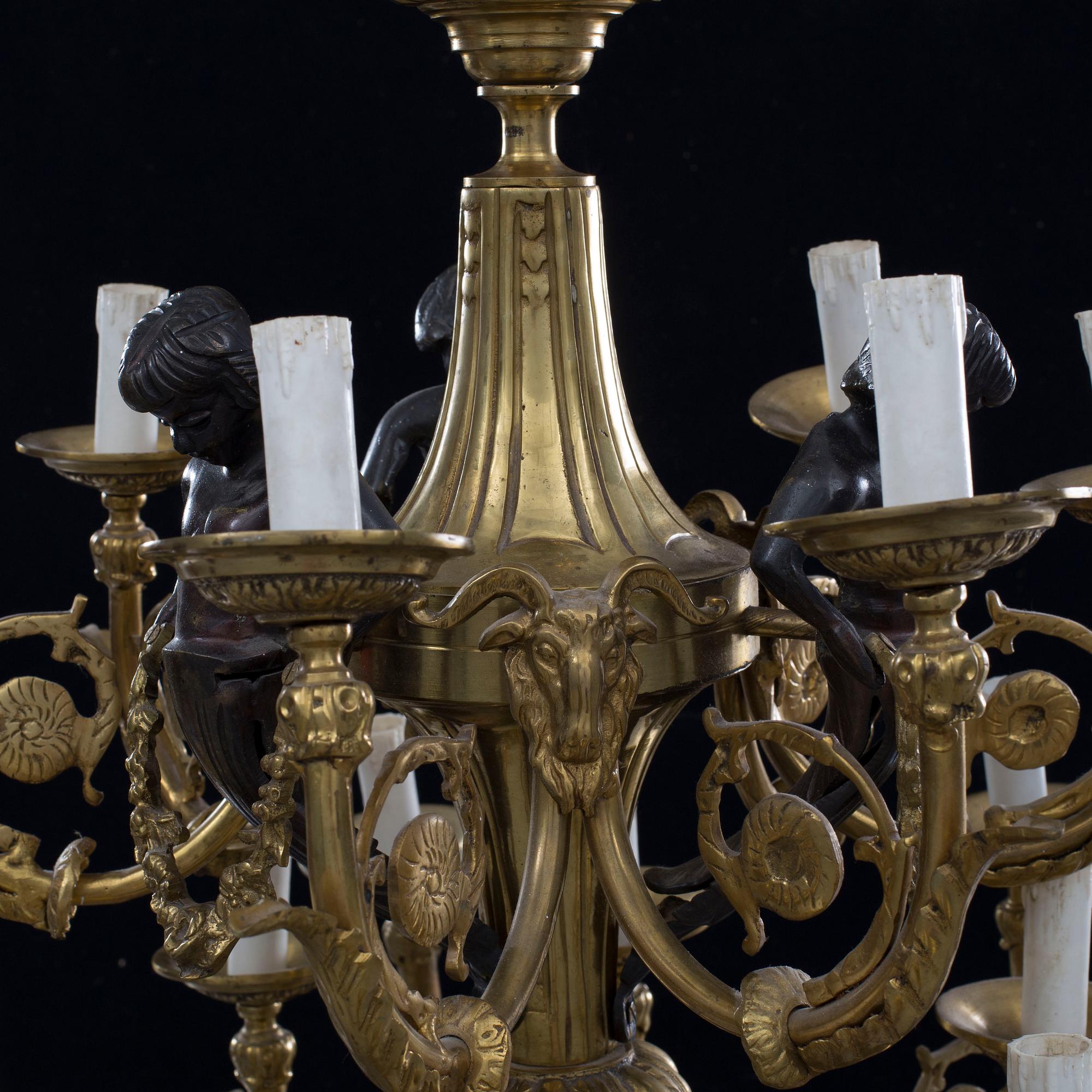 A Louis XVI-style brass chandelier, first half of the 20th Century.