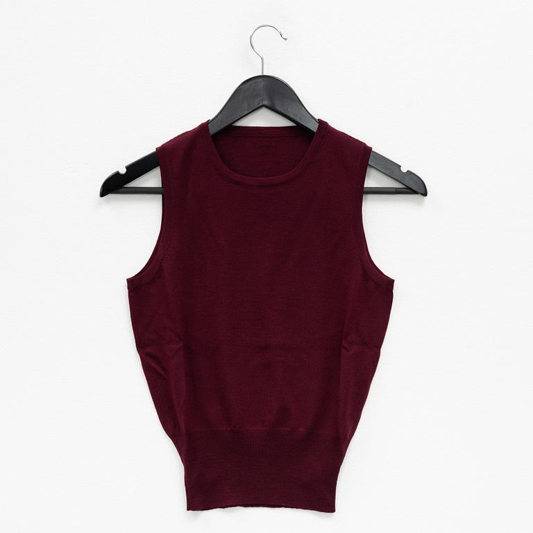 Alaïa, a burgundy wool twin set with cardigan and top, French size 38.