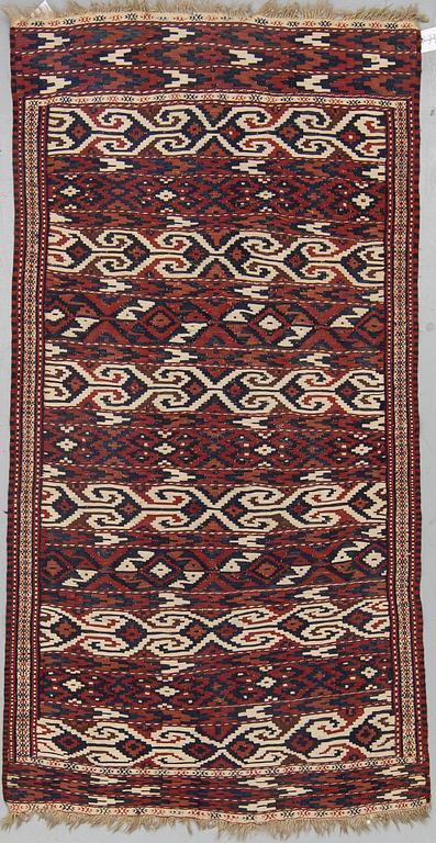 A semi-antique Turkman kilim, circa 189,5  x 96-104 cm.