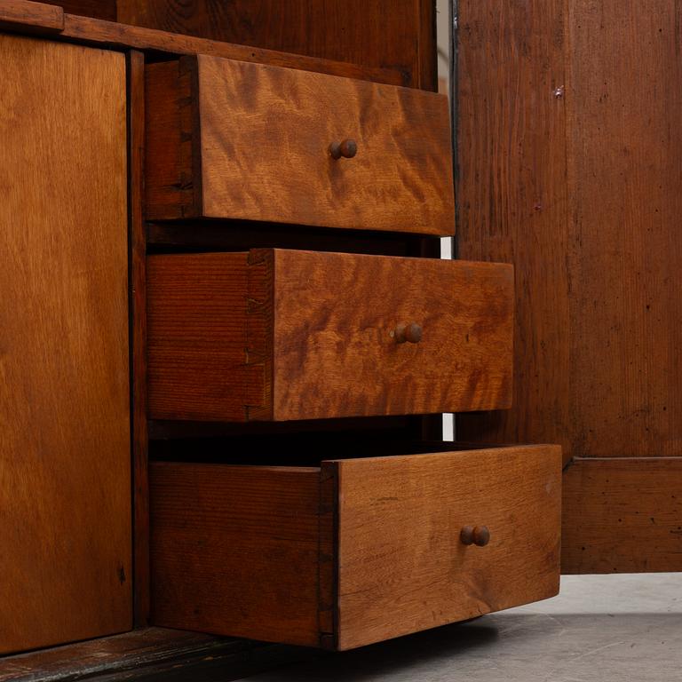 A wall-hanged cabinet, Sweden, dated 1851.