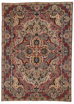219. A CARPET, semi-antique, Tabriz, signed Jabarzade ca 337,5 x 242,5 cm.