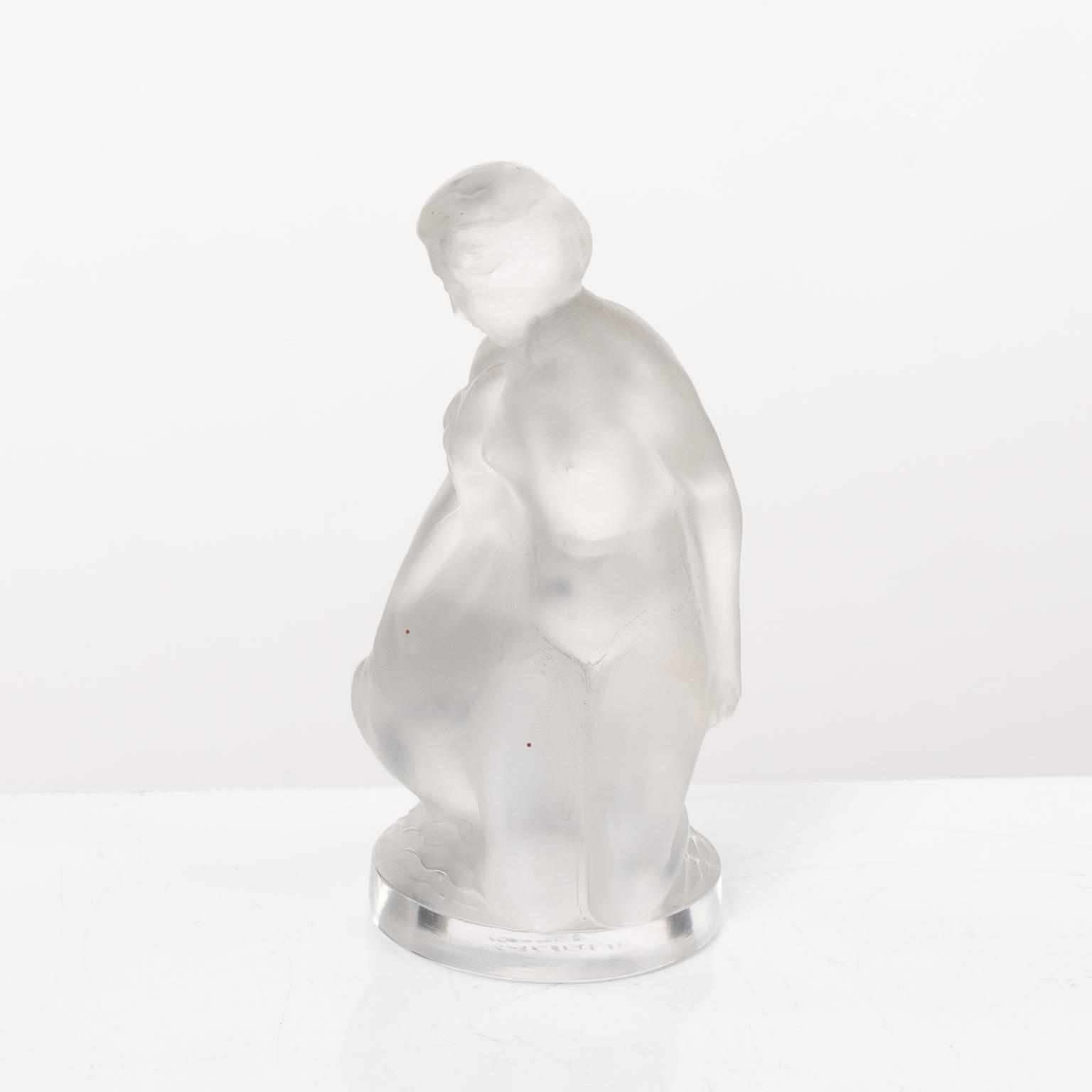 9 glass figurines, Lalique, France.