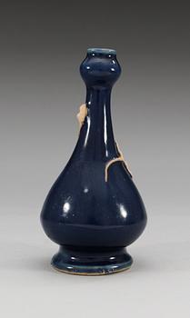 A blue glazed vase with a qilin, Qing dynasty (1644-1912).