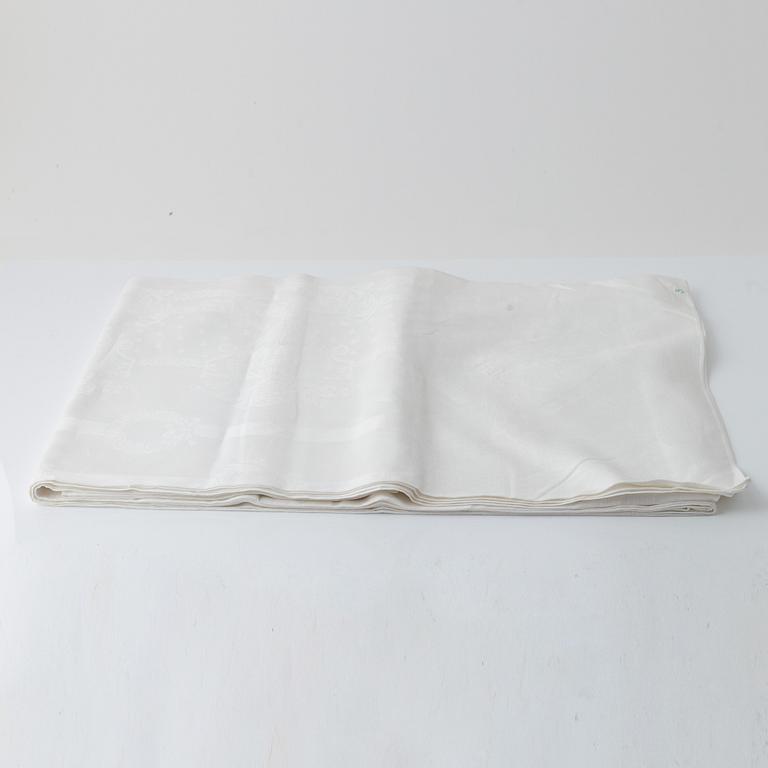 Four linen damask tablecloths.