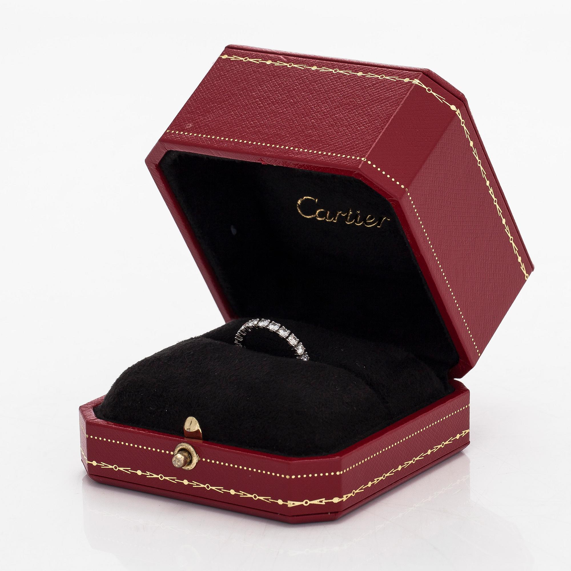 Cartier, a platinum and brilliant-cut diamond eternity ring.