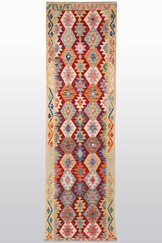 A runner, kilim, ca 314 x 80 cm.