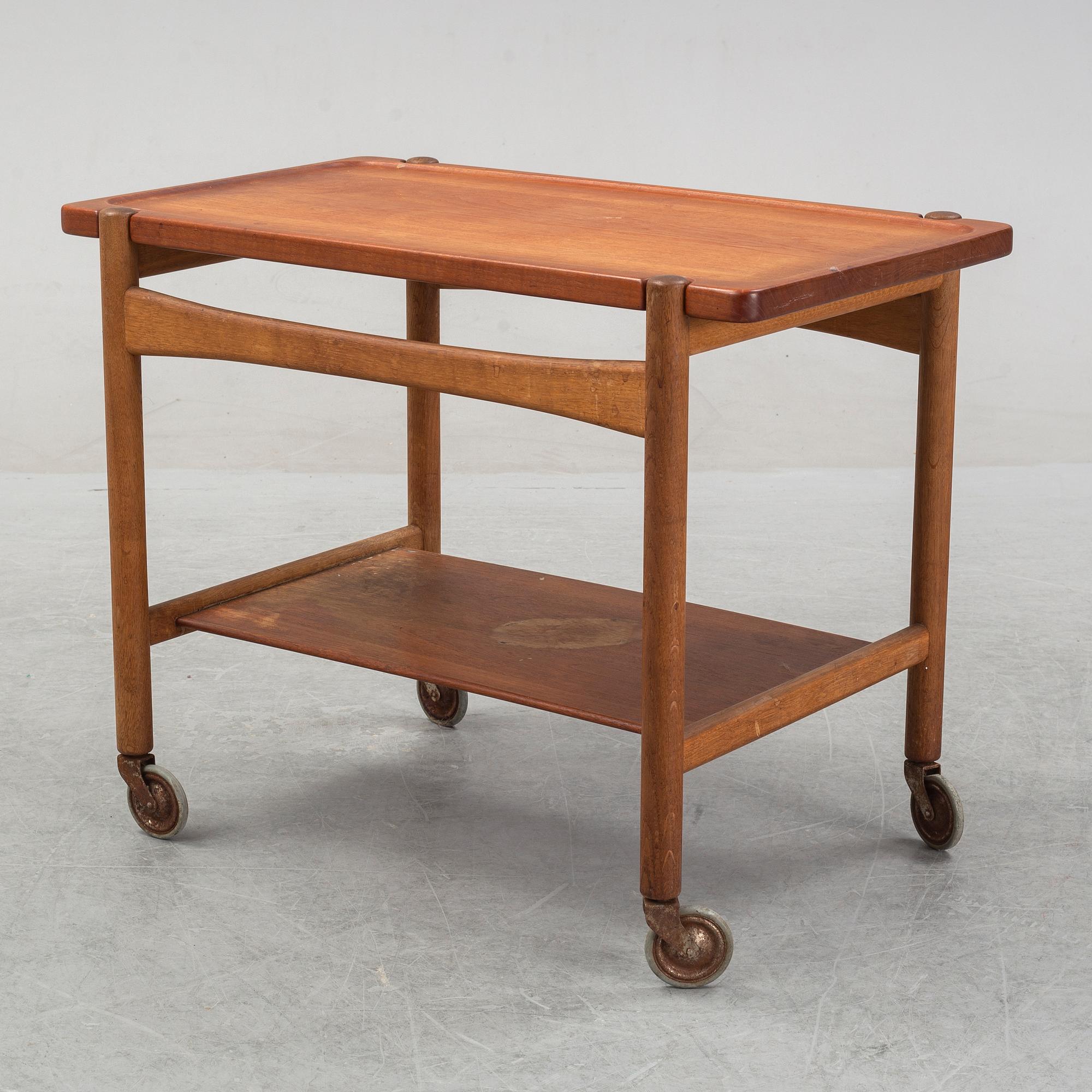 Hans J Wegner, a teak and oak serving trolley from Andreas Tuck, Denmark.