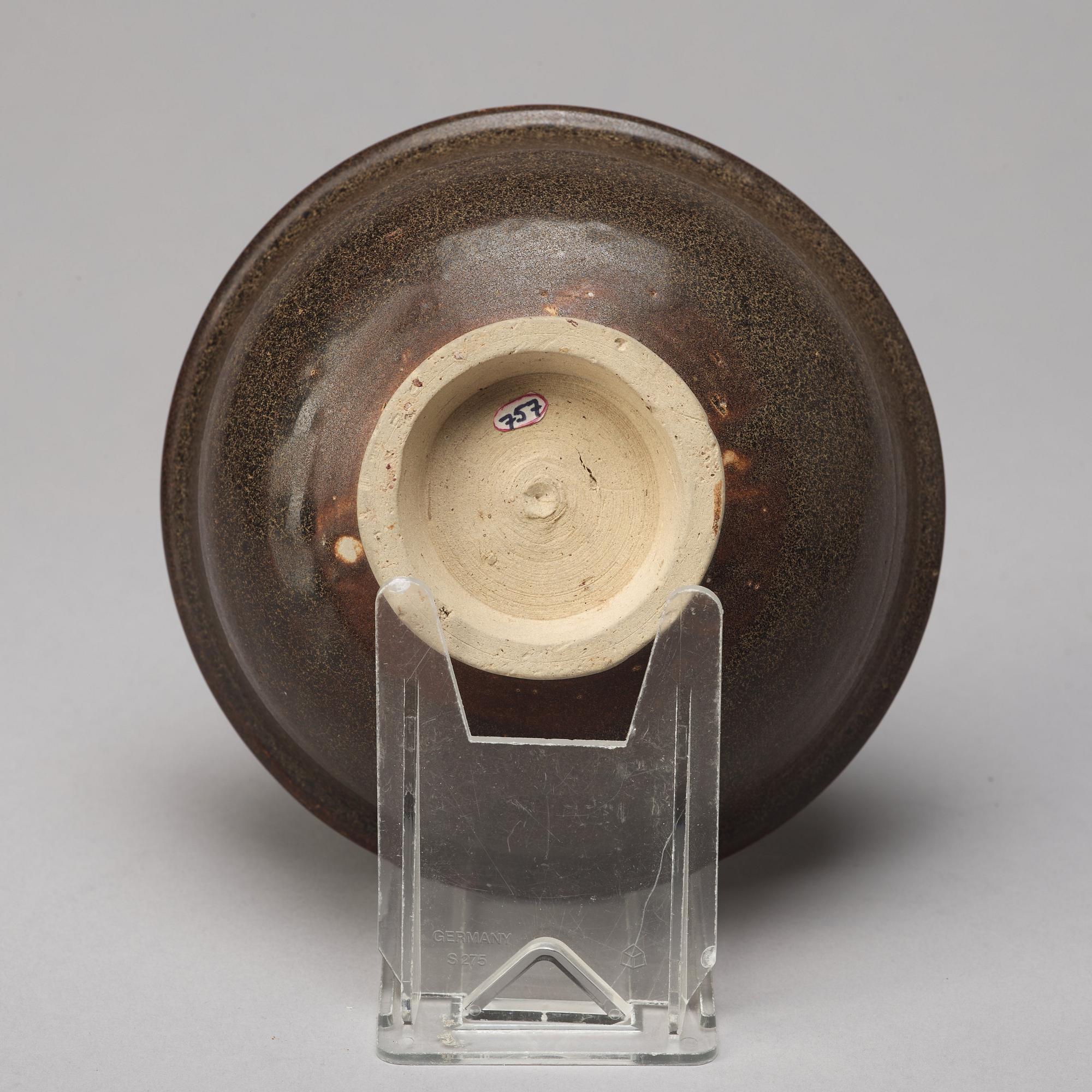 A group of three brown glazed bowls, China, 20th Century.