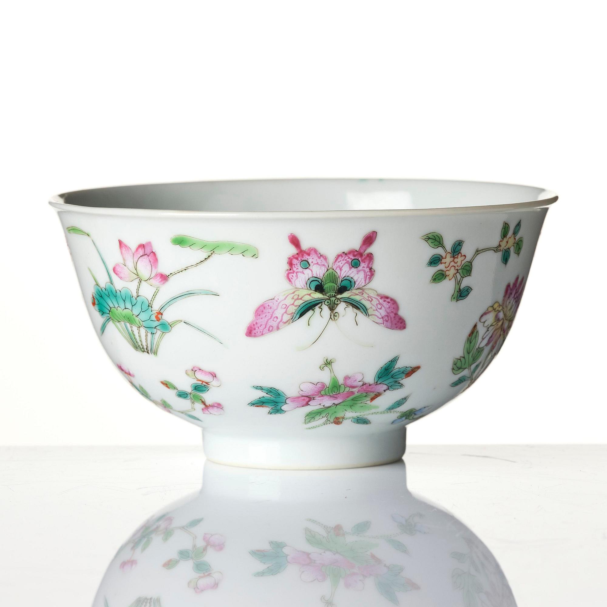 A famille rose 'butterfly' bowl, Qing dynasty with Daoguang mark and of the period (1820-1850).