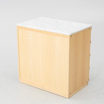 A contemporary chest of drawers.