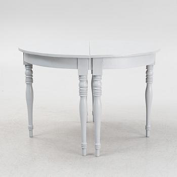 A late 19th century painted dining table.