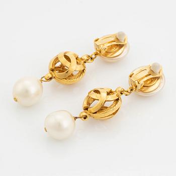 Chanel, a pair on gold tone and pearl clip-on earrings.