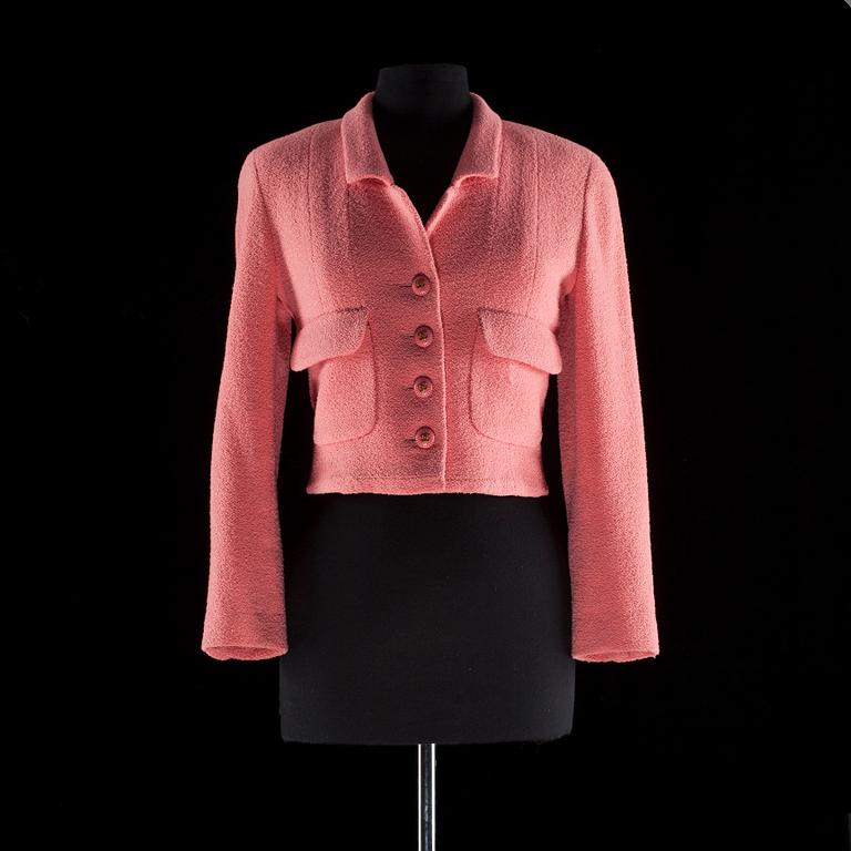 A pink bouclé jacket by Chanel.