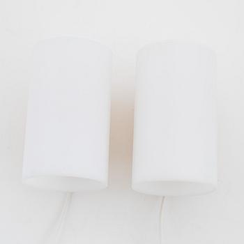 A pair of pine and acrylic wall lights, Luxus, Vittsjö.