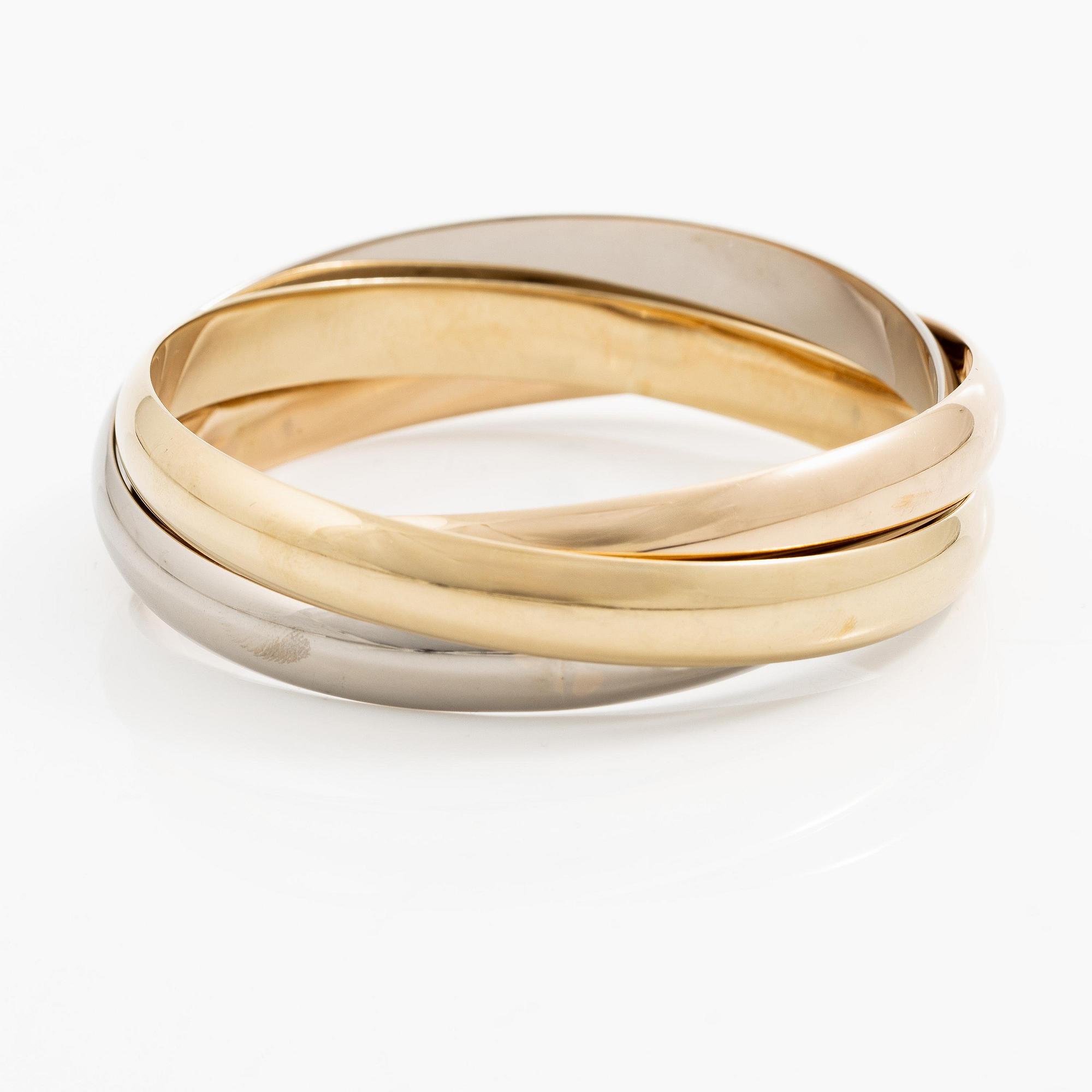 Cartier a bracelet "Trinity" 18K gold in three different colours.