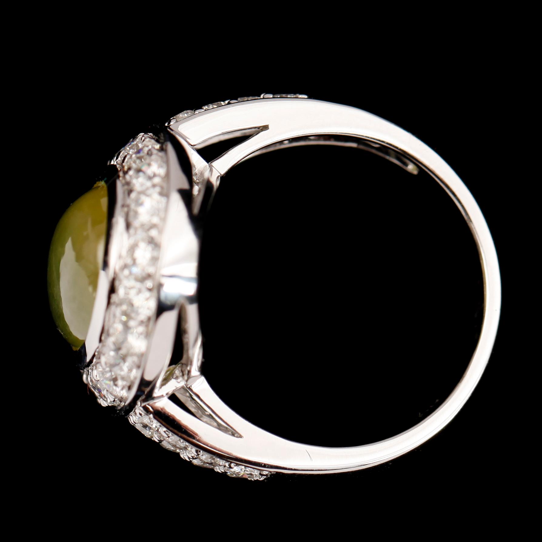 RING, 18 k vitguld, med safir 5.92 ct och briljanter tot 1.04 ct TW.