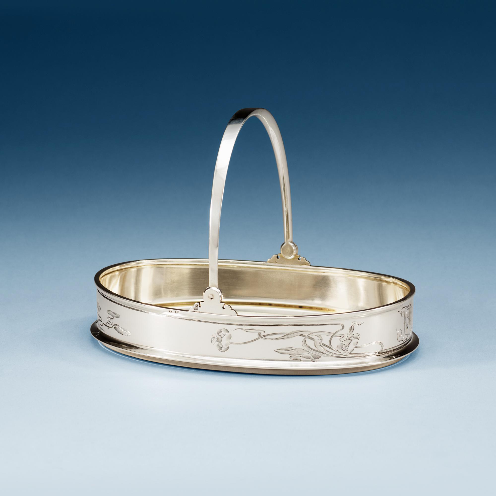 A Russian 19th century silver basket, makers mark of Oreste Kurlukov, Moskva 1896-1908.