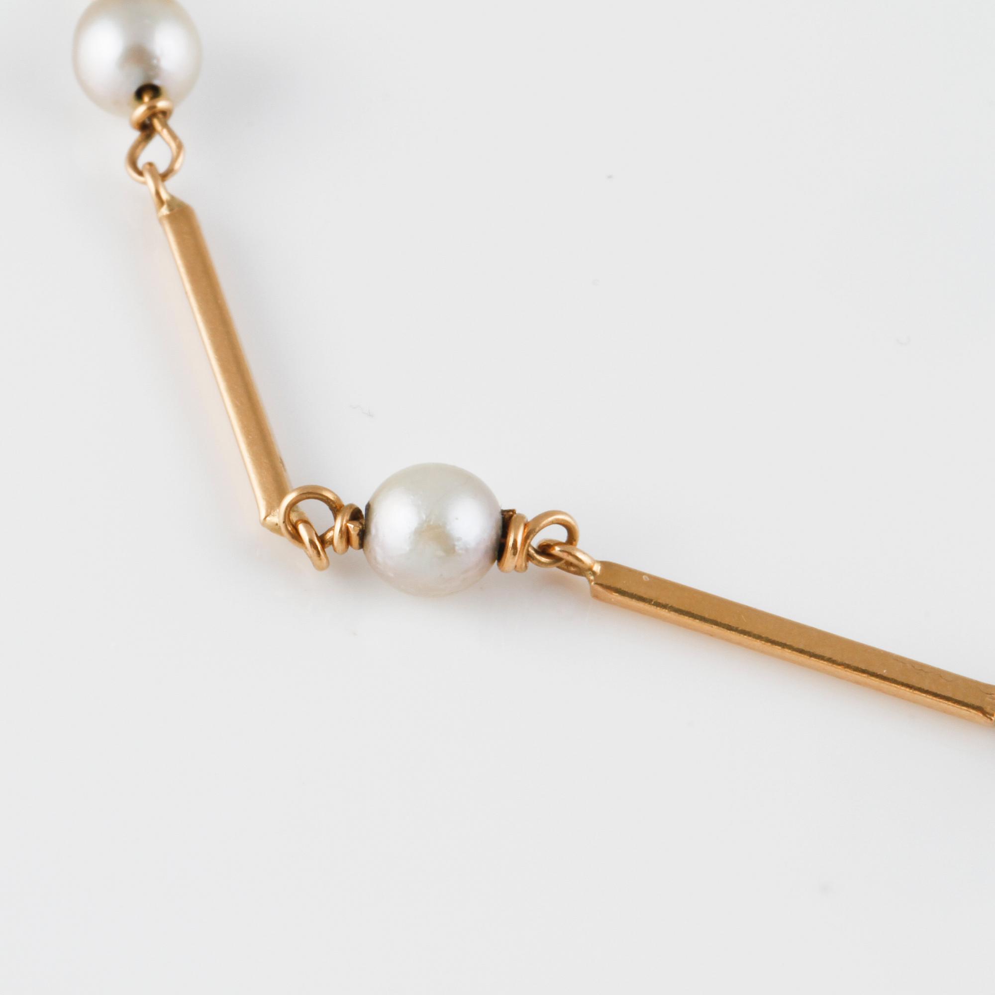 ARMBAND, 18K guld med 7 odlade pärlor, kattfotstämplat 1961. Vikt 3,7 gram.