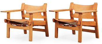 81. A pair of Børge Mogensen oak and leather 'Spanish chairs', Fredericia stolefabrik, Denmark.
