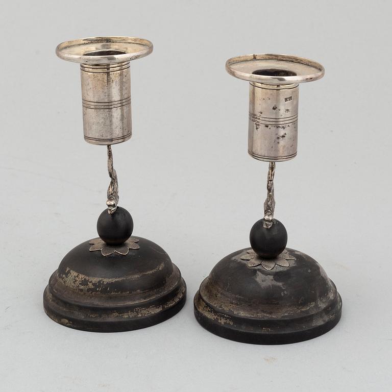 A pair of Empire candle sticks by Carl Gustaf Lundgren, Österstund (1867-1869).