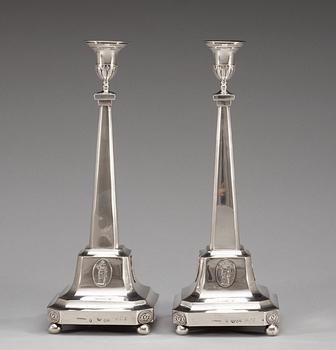 A pair of 18th century silver candelabra and a pair of candlesticks, makers mark of Pehr Zethelius, Stockholm 1796.