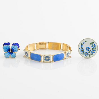 David Andersen, bracelet and two brooches, gilded silver and enamel, Norway.