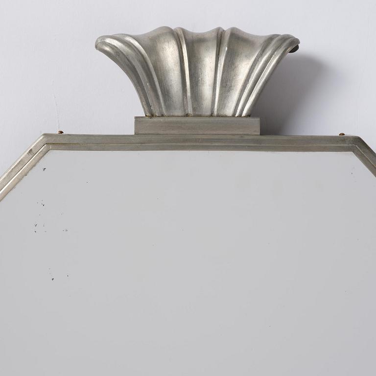 Firma Svenskt Tenn, a pewter wall mirror model "244", Stockholm, 1931.