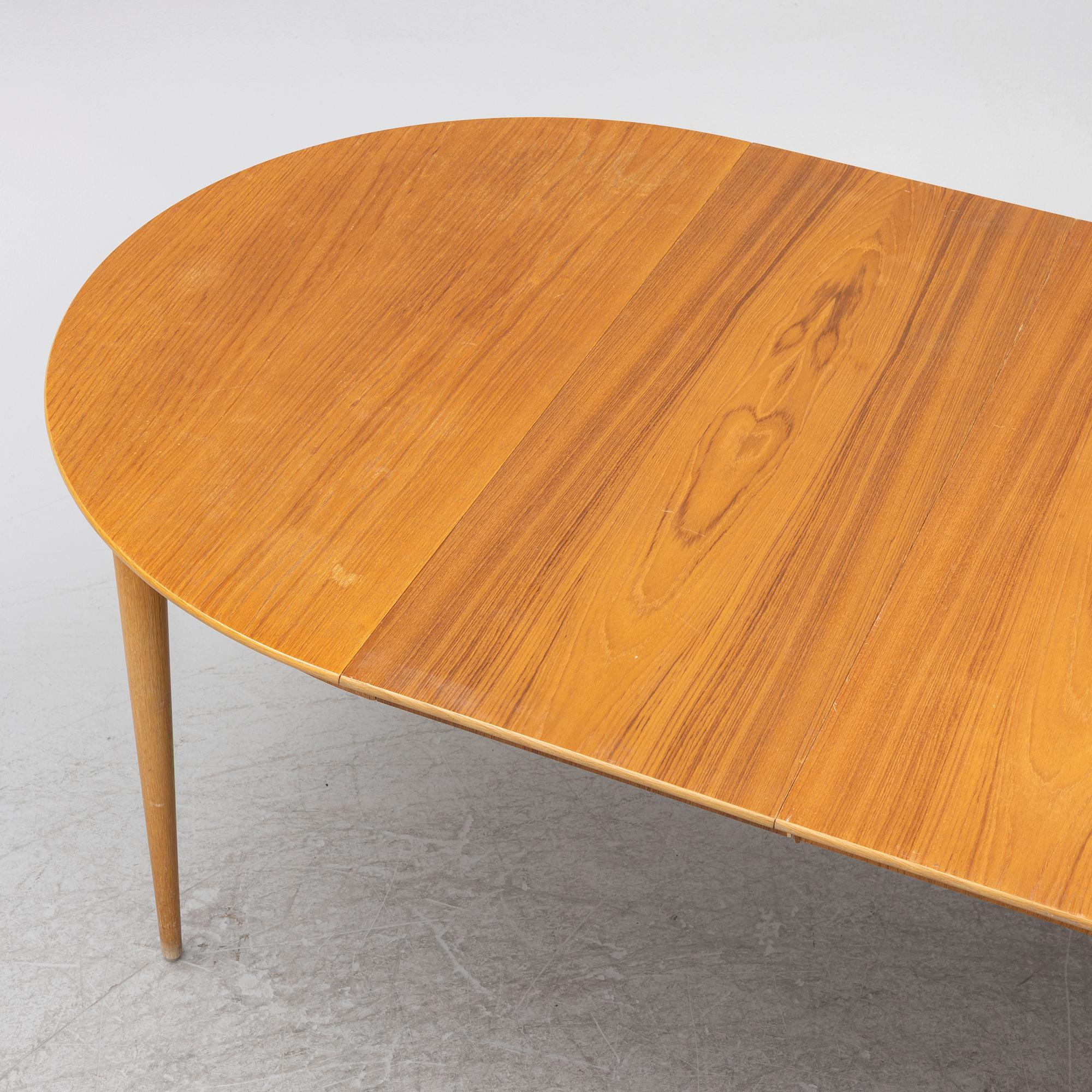 Dining table, mid-20th century.