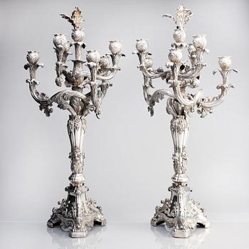 A pair of Swedish mid 19th century silver candelabra, marks of Gustaf Möllenborg, Stockholm 1844.