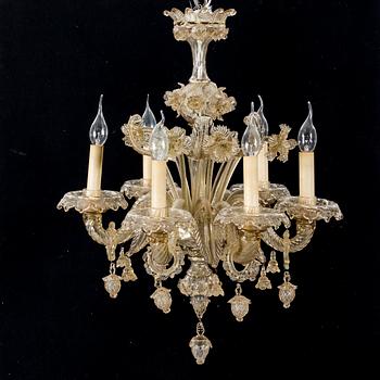 A 20th century six light Venetian style glass chandeliere.