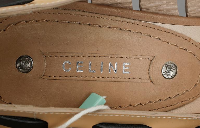 SKOR, Céline.