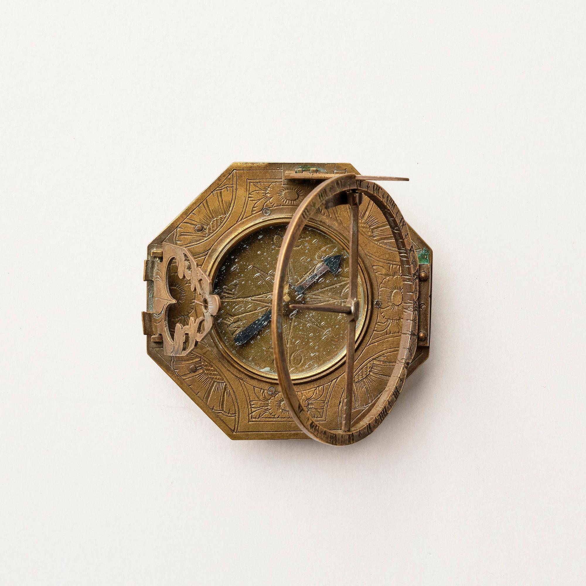 An engraved brass octagonal equinoctial compass sundial by Andreas Vogler (Augsburg, c. 1766-90).