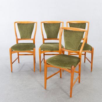 David Rosén, A table and flour chairs.