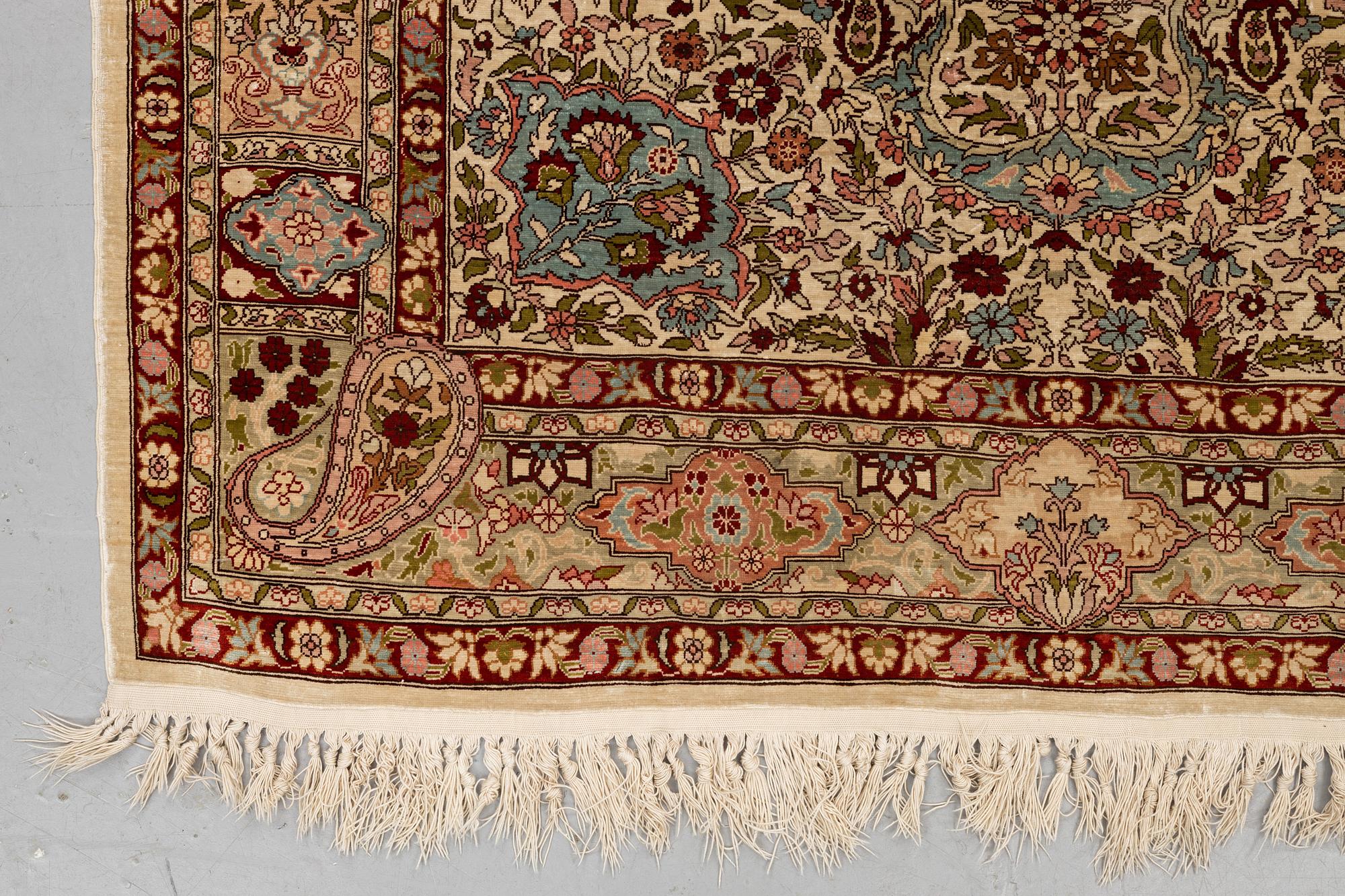 A rug, Old silk Hereke, ca 152 x 110 cm.