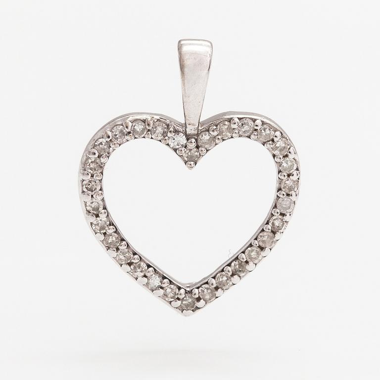 Riipus, 14K valkokultaa, timantteja n. 0.15 ct yht. Kultajousi, Helsinki.