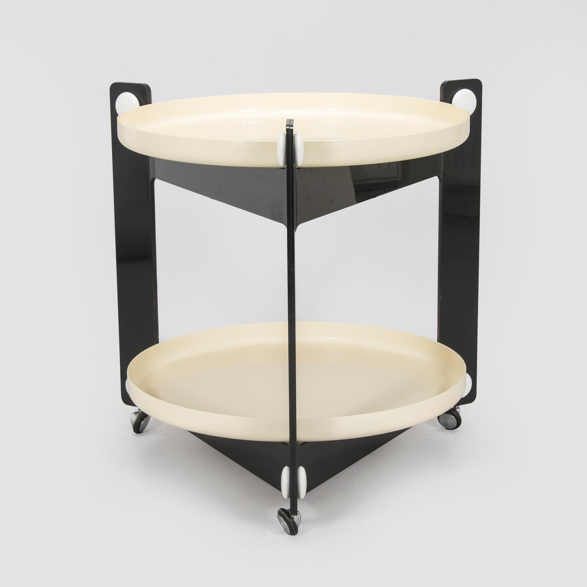 Luigi Massoni, a 1970s table / tray table, for Guzzini, Italy.