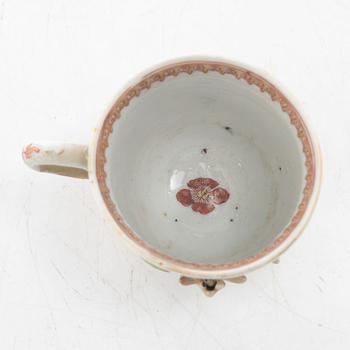 A small Chinese famille rose porcelain tureen with cover and stand, two salt cellars, Qing dynasty, Qianlong (1736-95).