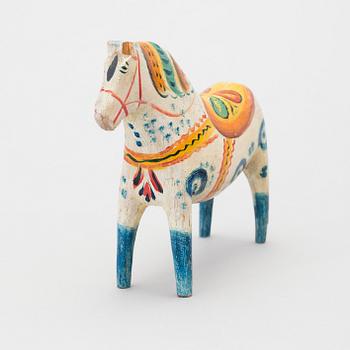 A painted folk art dala horse first half of the 20th century.