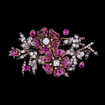 A BROOCH, rubies, old cut diamonds, gold and silver. Late 1800s.