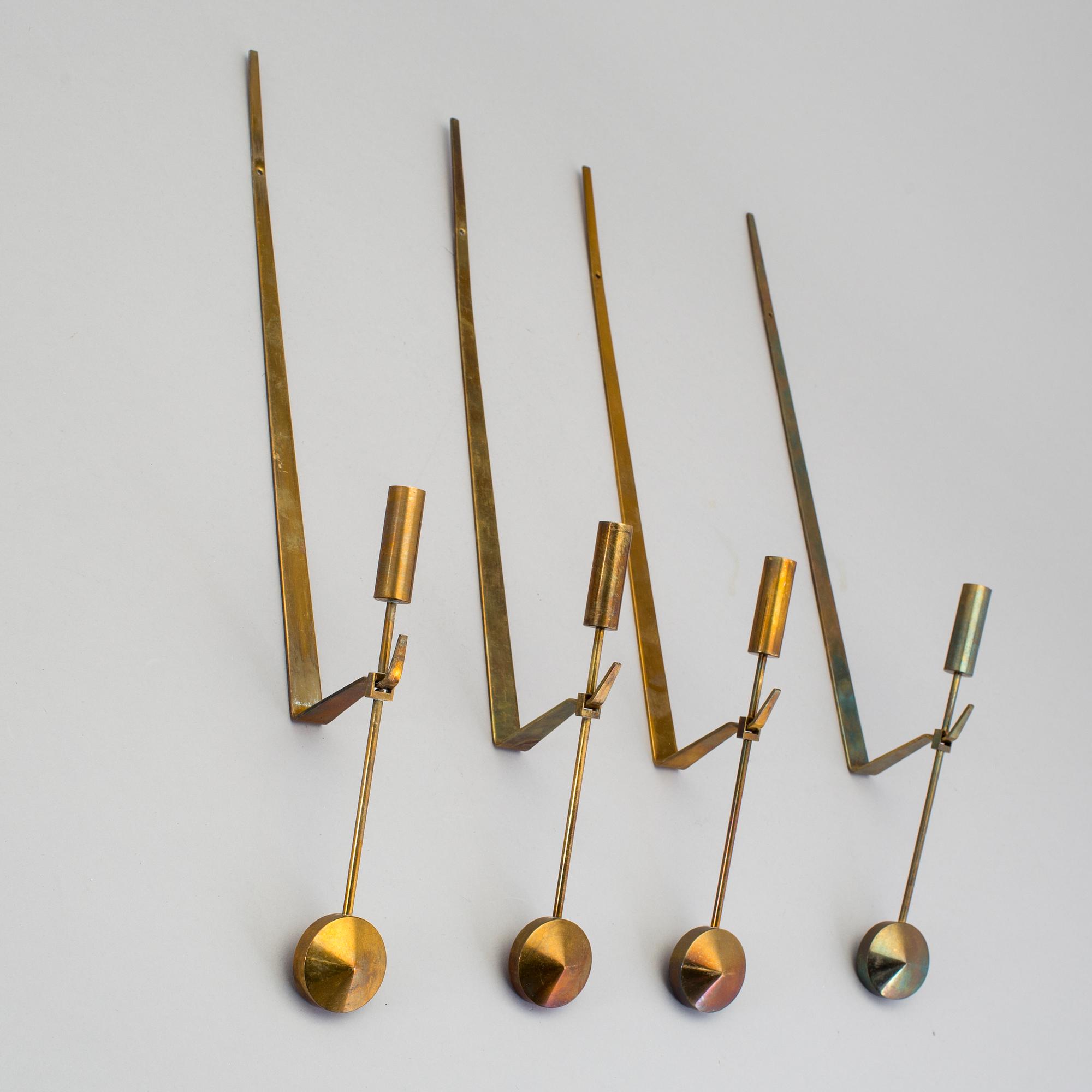 A set of four wall sconce by Pierre Forsell, Skultuna.