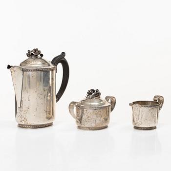 A Swedish silver coffee pot, cream jug and sugar bowl, mark of Caneman & Wallen, Stockholm 1949.