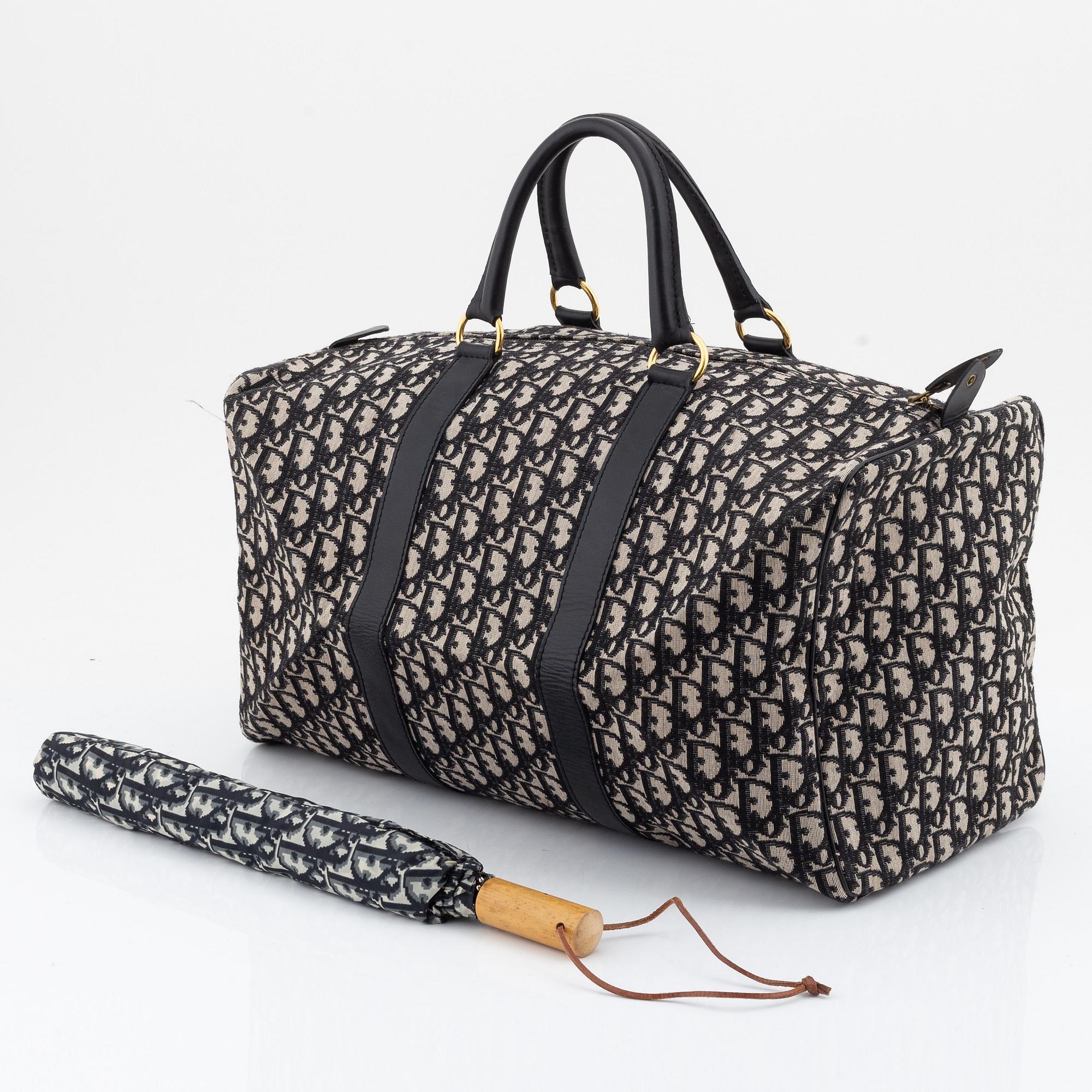 Christian Dior, weekendväska med paraply.