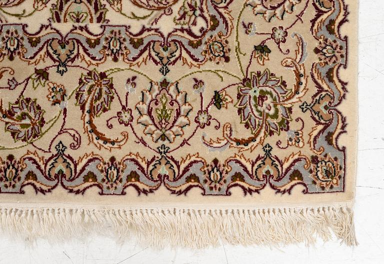 An Isfahan part silk rug, c. 161 x 110 cm.