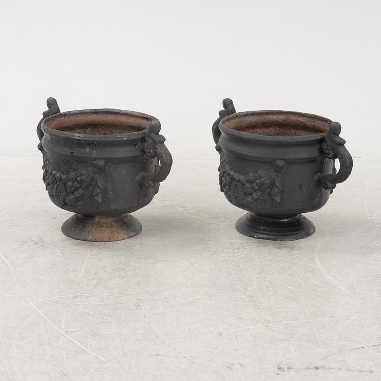 A pair of cast-iron urns from Stafsjö Bruk, 20th Century.