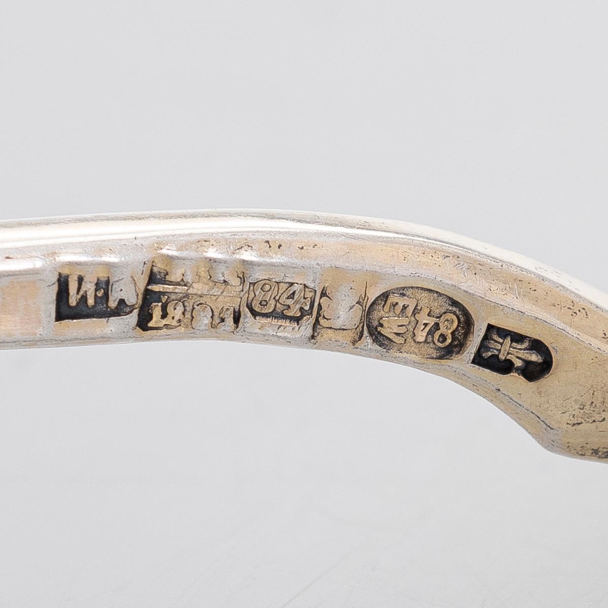 A parcel-gilt silver jam spoon, Moscow 1881.