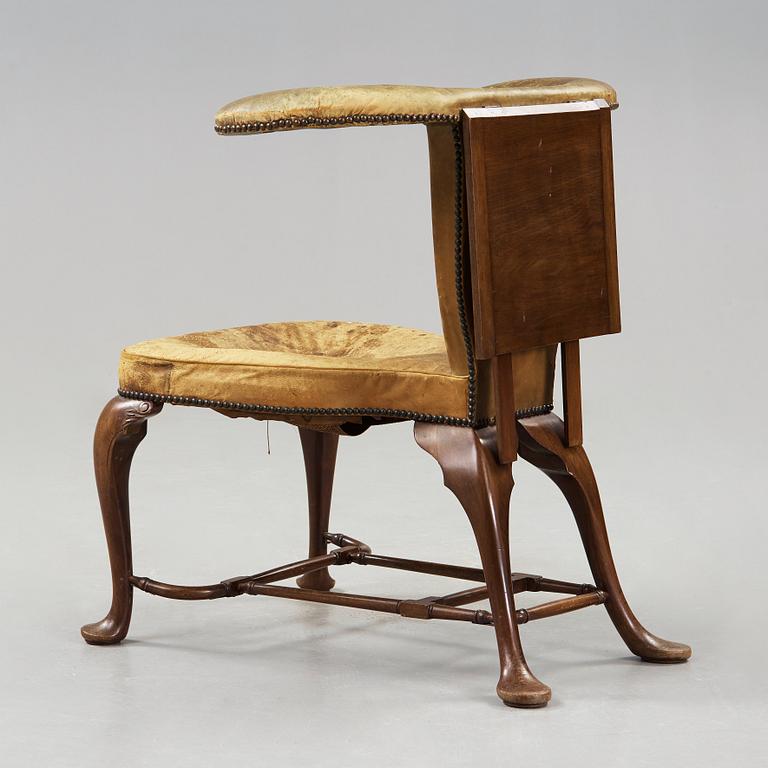 An English 18th century reading and writing chair.