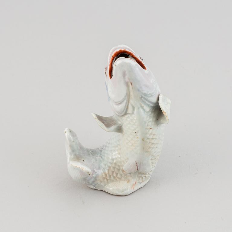 A Japanese porcelain model of a leaping fish, Meiji period (1868-1912).