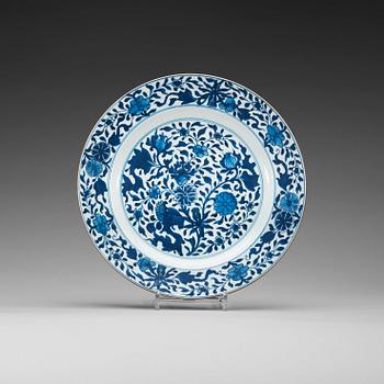 1718. A blue and white dish, Qing dynasty, Kangxi (1662-1722).