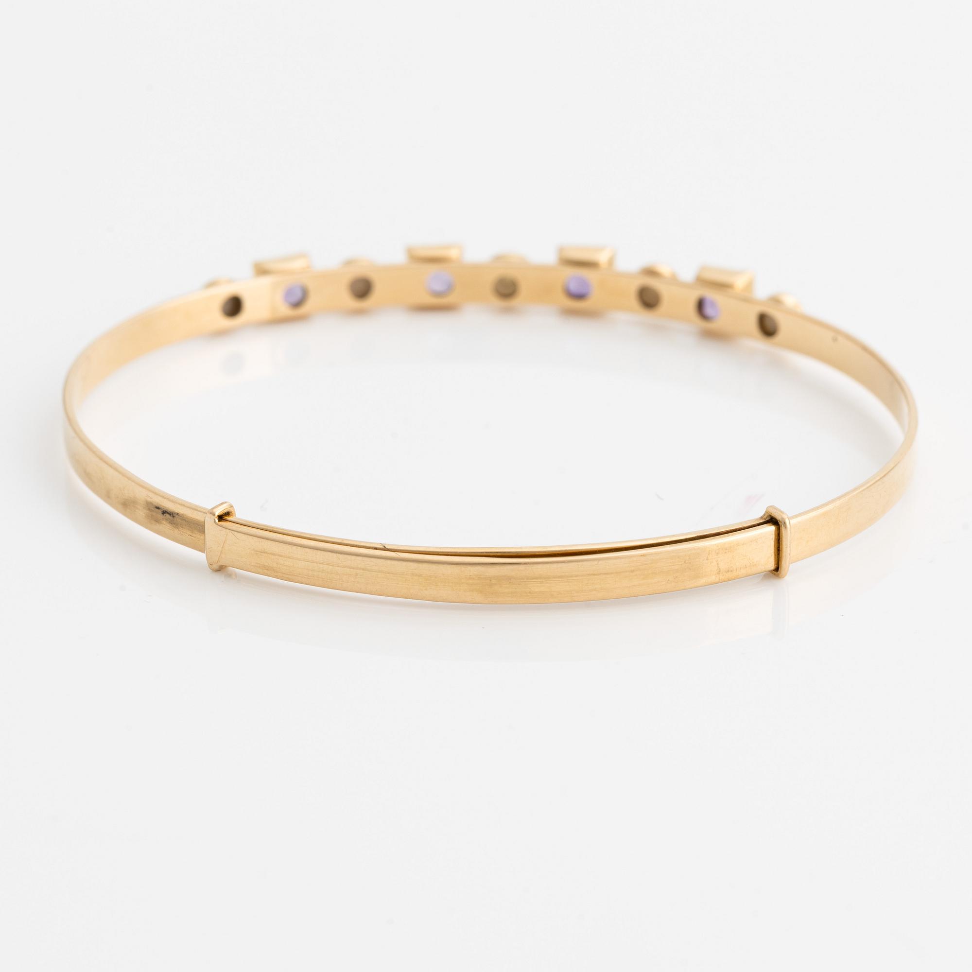 Armring, 18K guld med pärlor och ametister. Stockholm 1964.